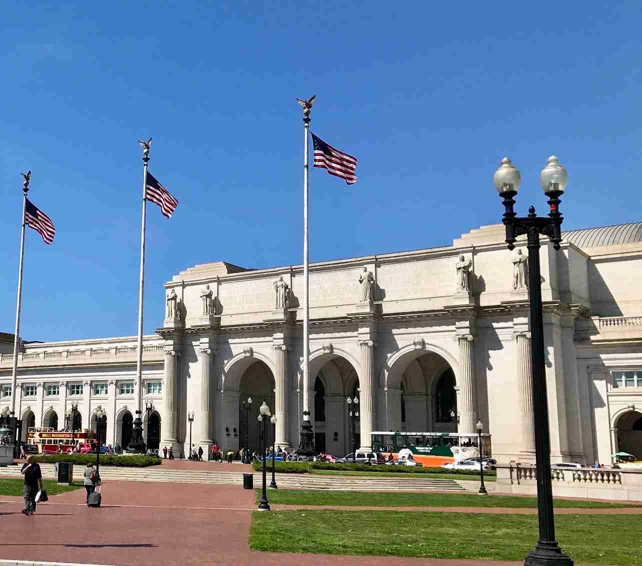 Union Station Washington DC landmark with American flags, representing U.S. business presence and digital marketing services.