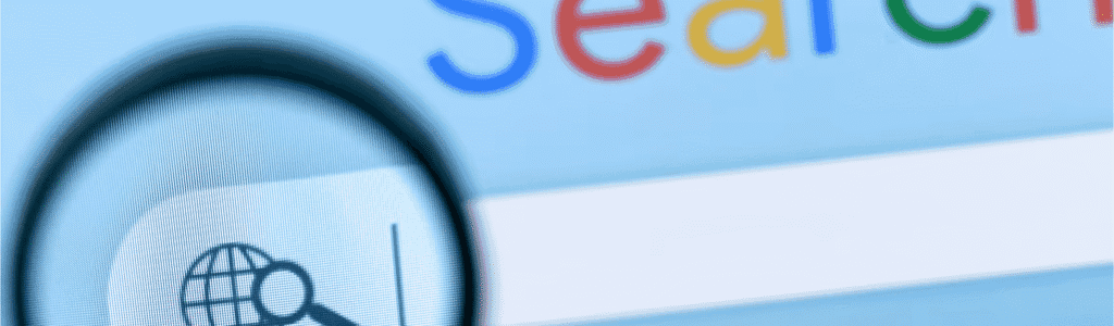 Magnifying glass over a search engine page, representing local SEO and improved search visibility for businesses.